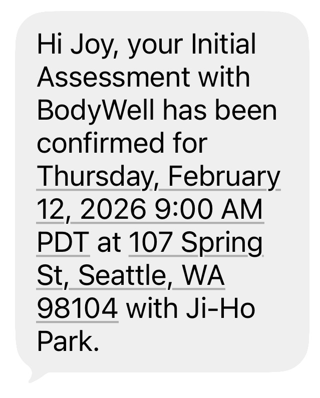 SMS appointment reminder message showing confirmation details